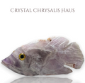 Crystal Chrysalis Haus hand-carved rough amethyst crystal fish figurine with a detailed eye for spiritual decor.