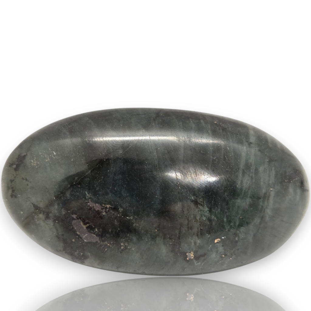 A polished dark gray stone oval with natural marbling and a glossy finish, displayed on a white background