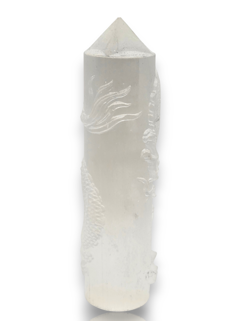 Crystal Chrysalis Haus A tall, cylindrical white crystal tower with a pointed top, featuring carved dragon motifs, shown on a plain white background 