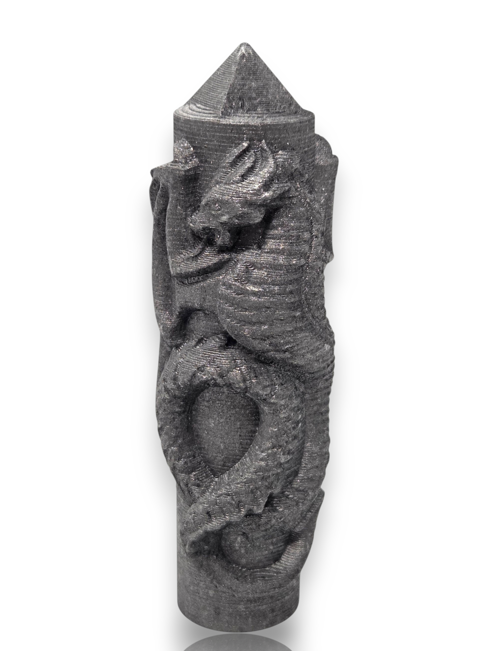 Crystal Chrysalis Haus A dark gray, dragon-carved cylindrical object with a pointed top, shown on a plain white background 