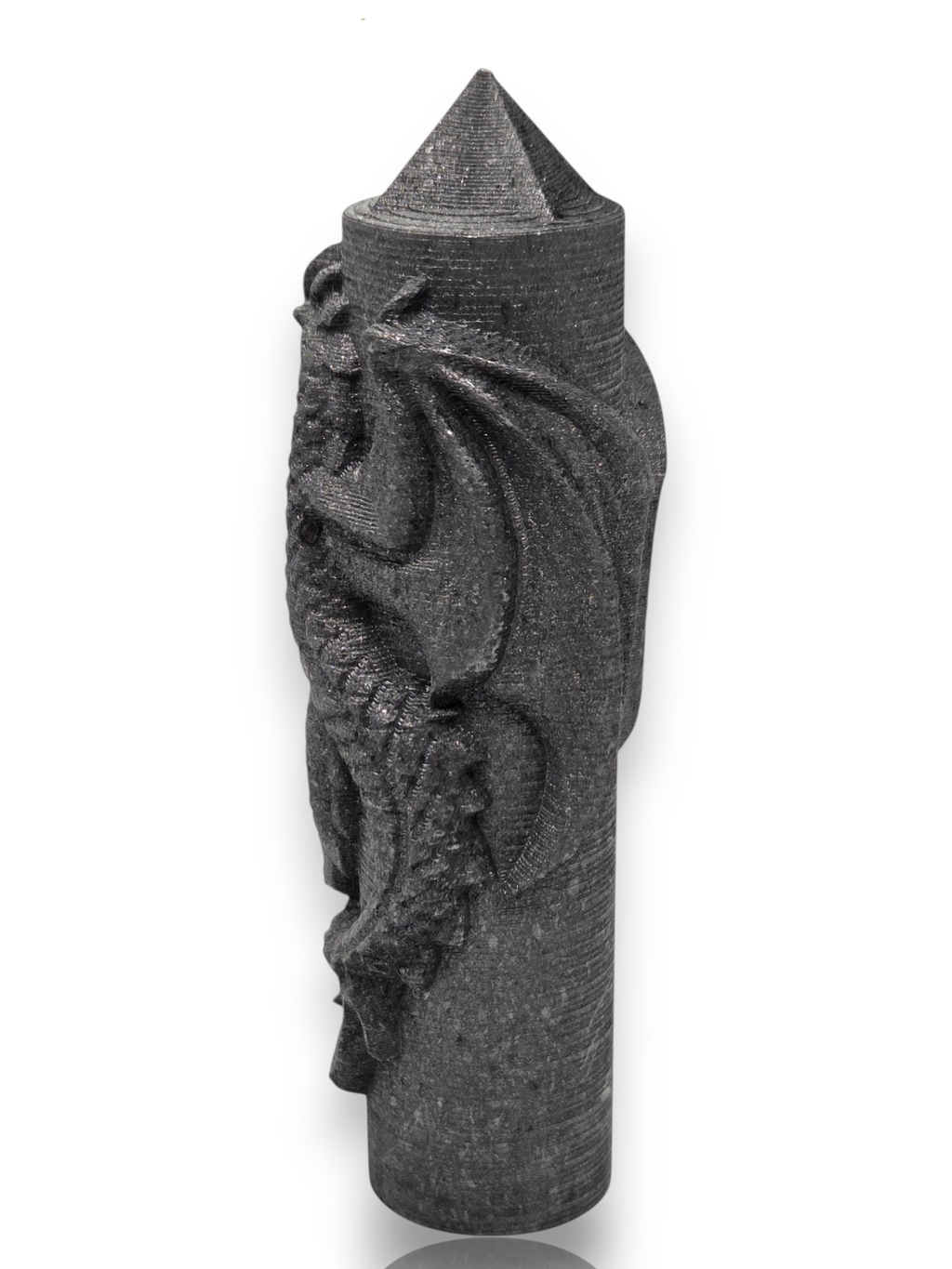 Crystal Chrysalis Haus A dark gray, dragon-carved cylindrical candle with a pointed conical top, shown on a white background