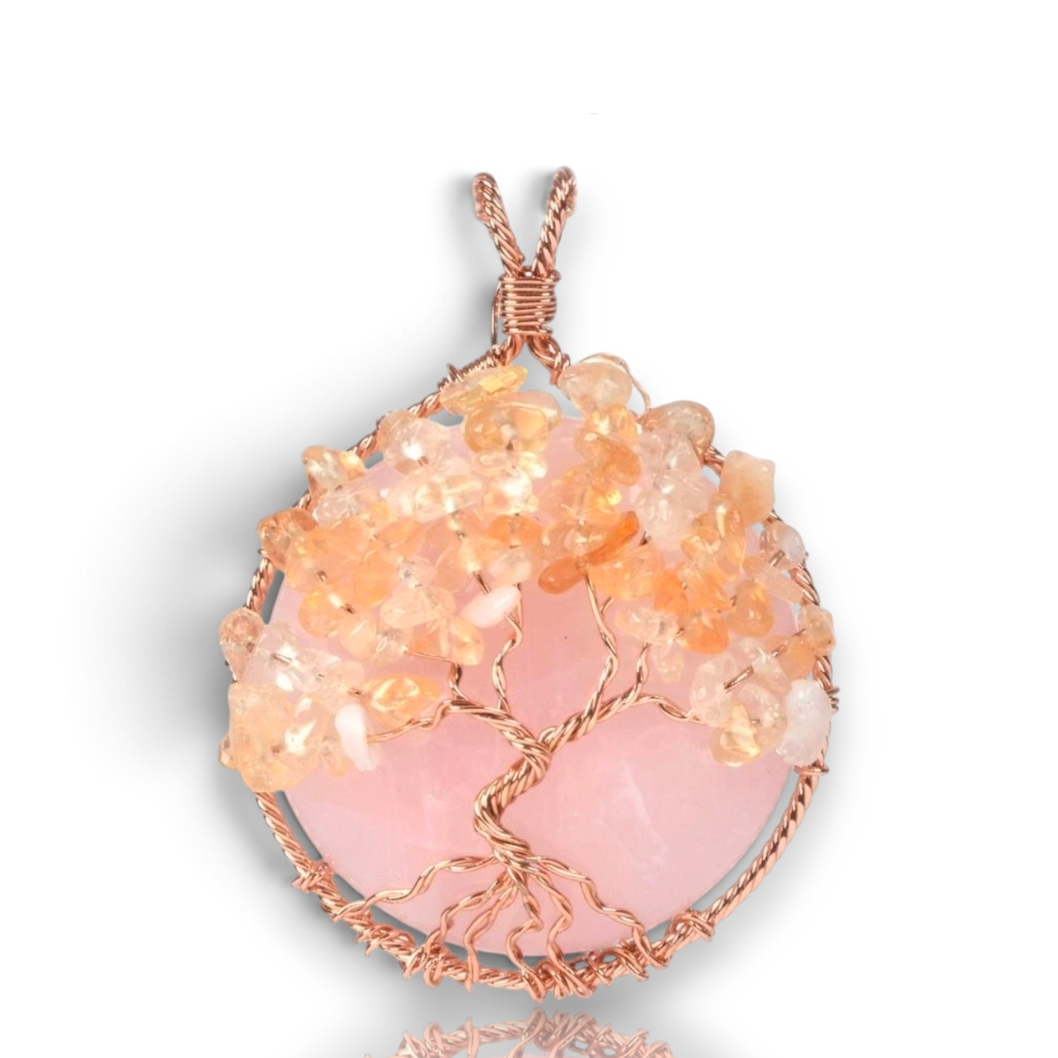 Crystal Chrysalis Haus A rose quartz and citrine tree-of-life pendant in copper wire, displayed on a clean white background 