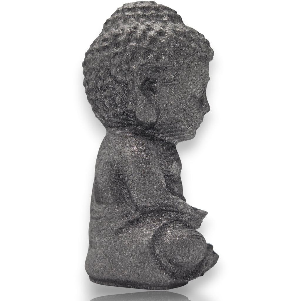Crystal Chrysalis Haus A small seated Buddha figurine with textured, stone-like gray hair and a dark charcoal gray body, shown in profile against a plain white background.