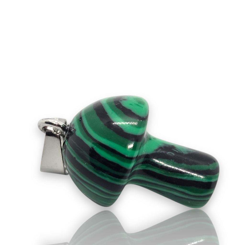 Crystal Chrysalis Haus A small green and black striped stone pendant with a silver metal clasp, shown on a clean white background with a soft reflection below.