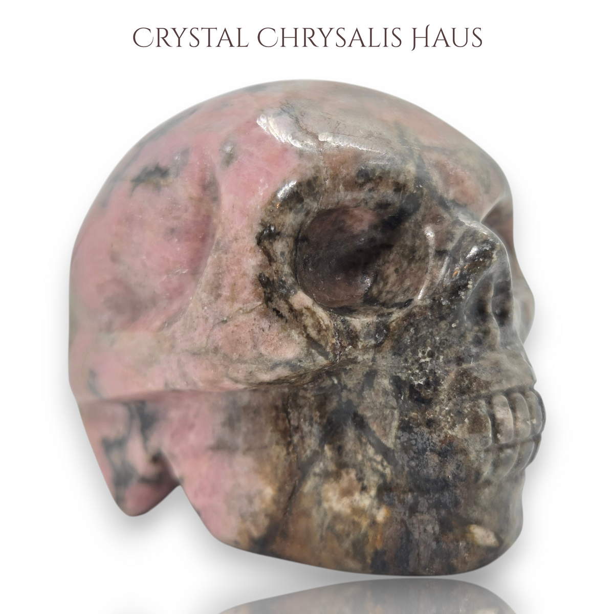 Natural Hand Carved Life Like Rhodonite Gemstone Skull