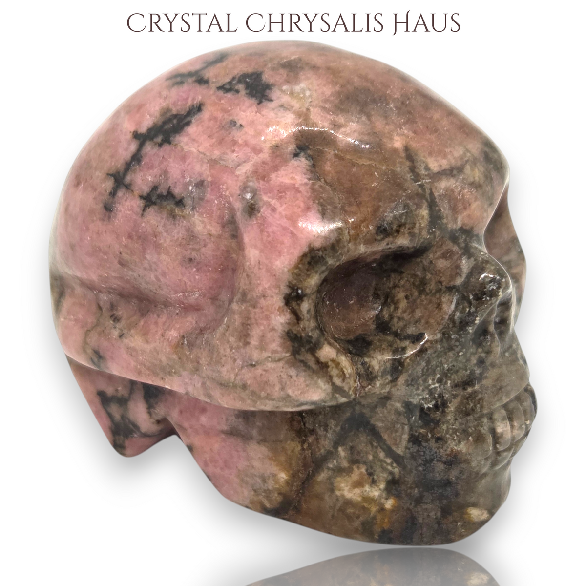 Natural Hand Carved Life Like Rhodonite Gemstone Skull