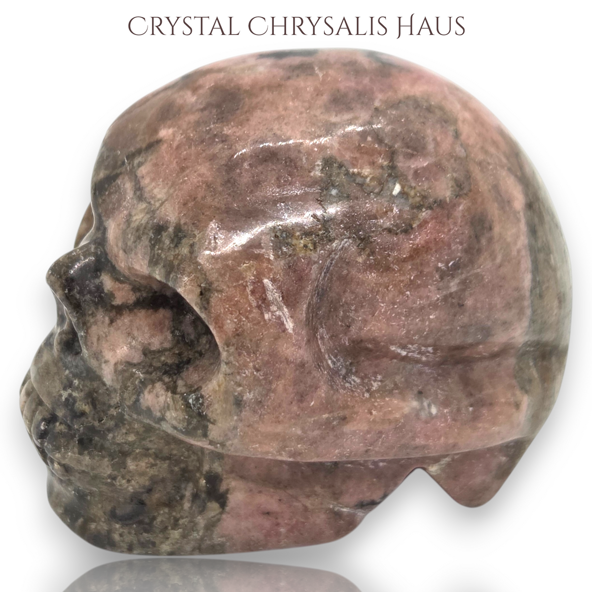 Natural Hand Carved Life Like Rhodonite Gemstone Skull